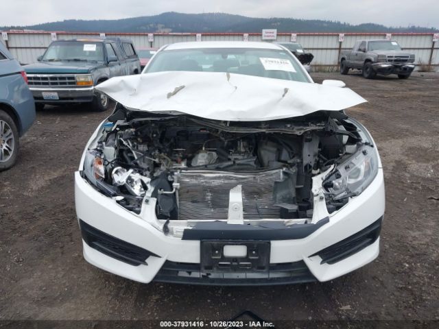 2HGFC2F54GH559011 Honda Civic Sedan Lx