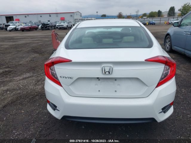2HGFC2F54GH559011 Honda Civic Sedan Lx