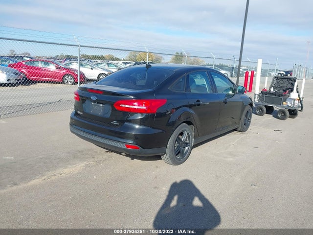 Ford Focus 2015 1FADP3F23FL274023 Image 16