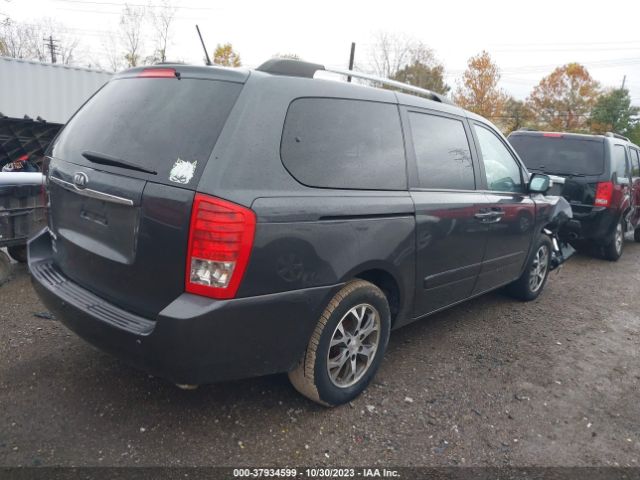 KNDMG4C79E6592855 KIA SEDONA LX