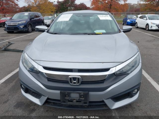 2HGFC1F99HH657479 Honda Civic Sedan Touring