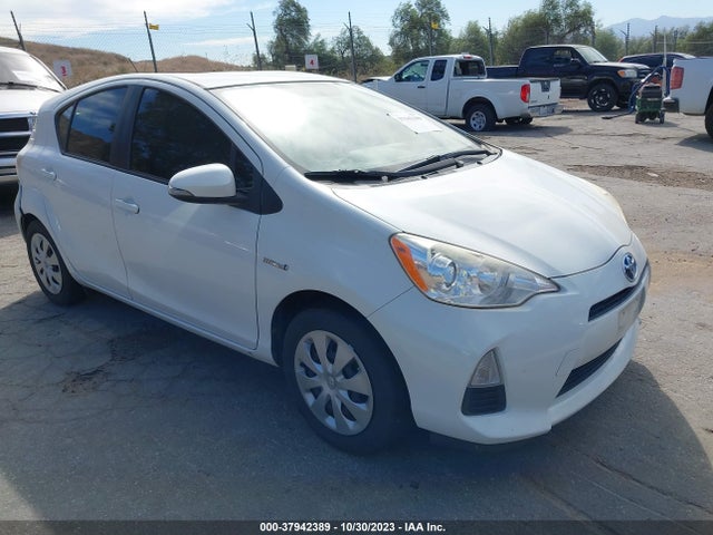 Toyota Prius C One/three/two/four 2014 JTDKDTB33E1571070 Image 1