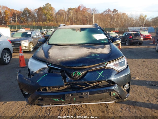 2018 TOYOTA RAV4 XLE/ADVENTURE VIN: 2T3RFREV6JW815458