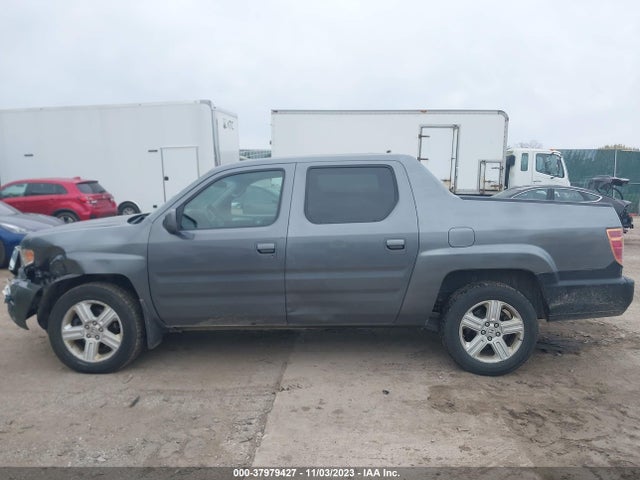 2011 HONDA RIDGELINE RTL VIN: 5FPYK1F50BB010402