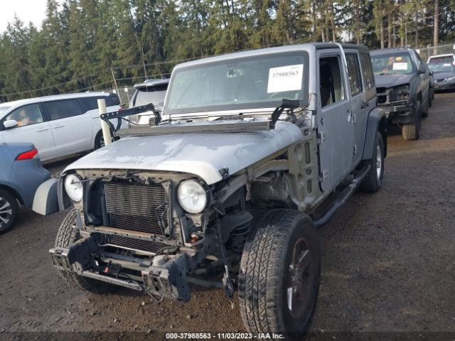 1C4BJWDG6EL116096 Jeep Wrangler Unlimited Sport