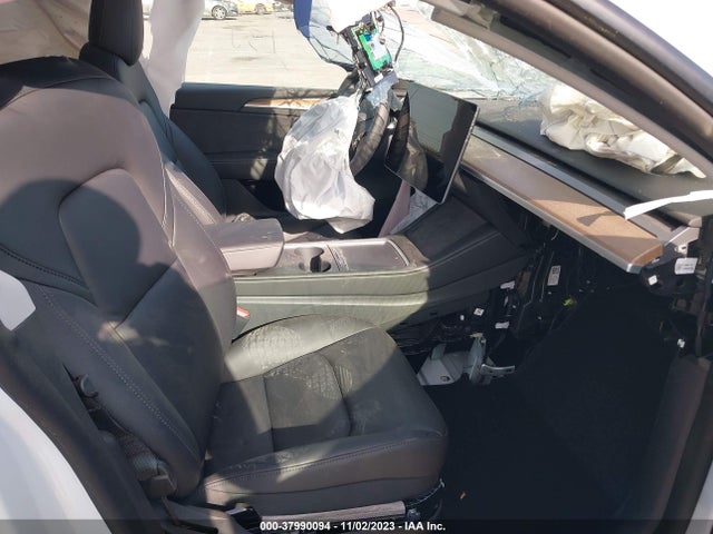 2023 TESLA MODEL Y 7SAYGDEE2PF589366 Photo 4