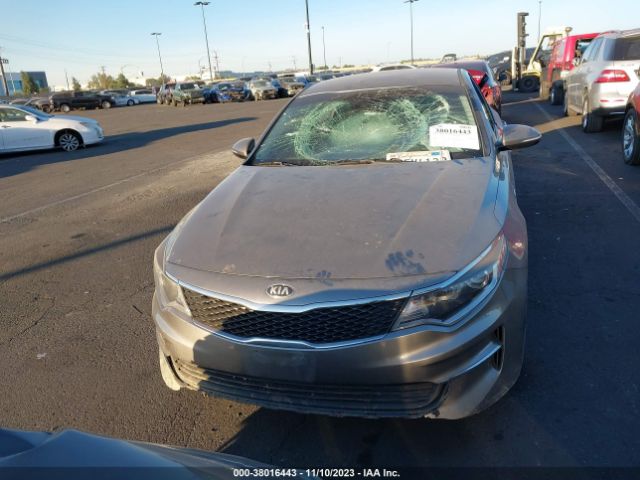 5XXGT4L3XGG008909 KIA Optima Lx