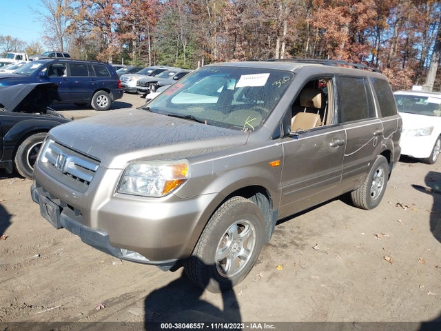 2007 HONDA PILOT EX-L VIN: 5FNYF28747B034162