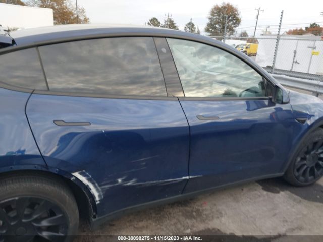 2023 TESLA MODEL Y 7SAYGAEE0PF709969 Photo 4