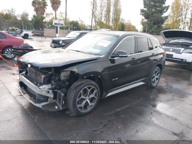 2018 BMW X1 WBXHU7C36J5H40104 Photo 1