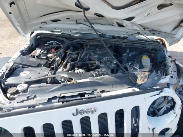 1C4AJWAGXFL580672 Jeep Wrangler Sport