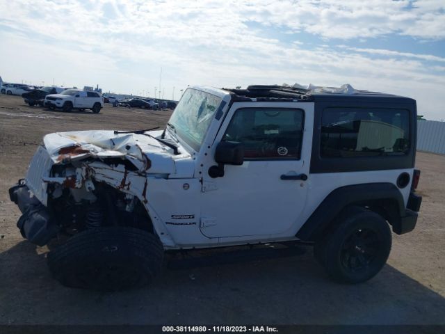 1C4AJWAGXFL580672 Jeep Wrangler Sport