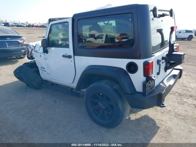 1C4AJWAGXFL580672 Jeep Wrangler Sport
