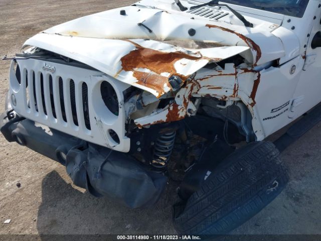 1C4AJWAGXFL580672 Jeep Wrangler Sport
