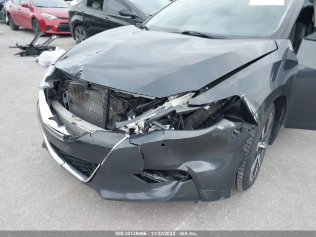 1N4AA6AP1GC385034 Nissan Maxima 3.5 Sl