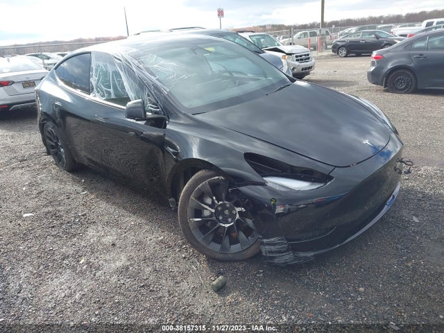 2023 TESLA MODEL Y 7SAYGAEE0PF863422 Photo 0