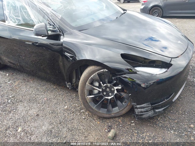 2023 TESLA MODEL Y 7SAYGAEE0PF863422 Photo 5