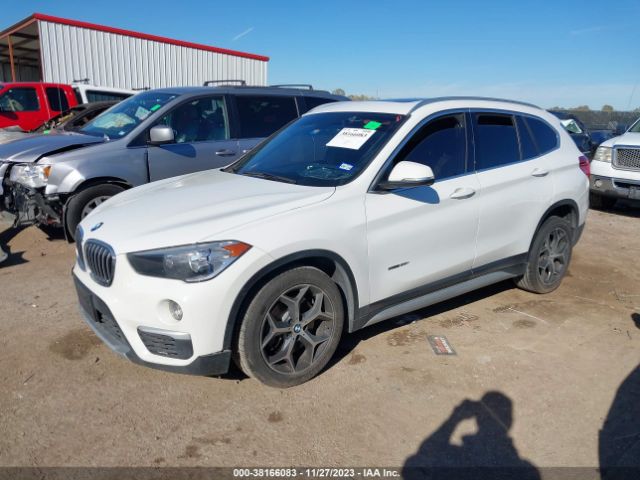 2018 BMW X1 WBXHU7C37J5H42458 Photo 1