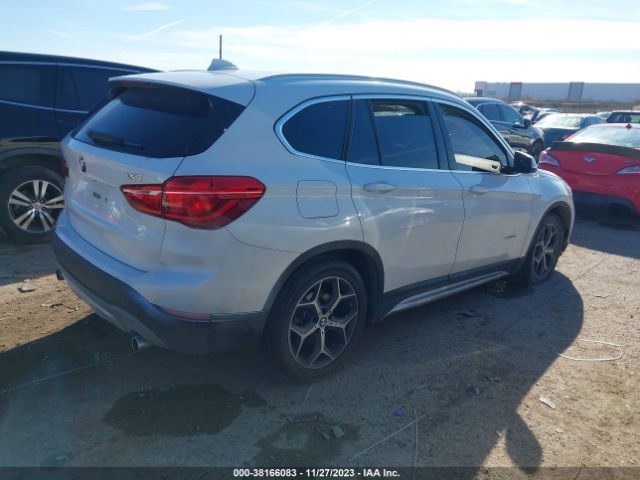 2018 BMW X1 WBXHU7C37J5H42458 Photo 3