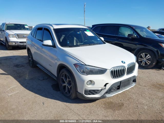 2018 BMW X1 WBXHU7C37J5H42458 Photo 5