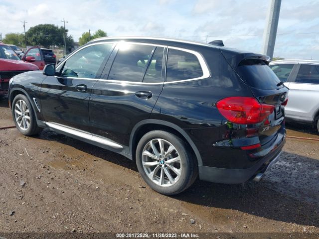 2019 BMW X3 5UXTR7C55KLF25447 Photo 2