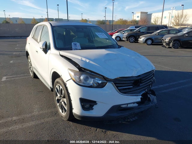 2016 MAZDA CX-5 GRAND TOURING VIN: JM3KE2DY3G0888489