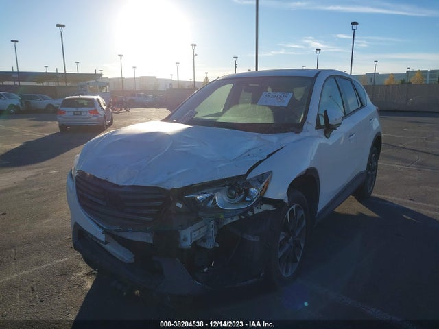 2016 MAZDA CX-5 GRAND TOURING VIN: JM3KE2DY3G0888489