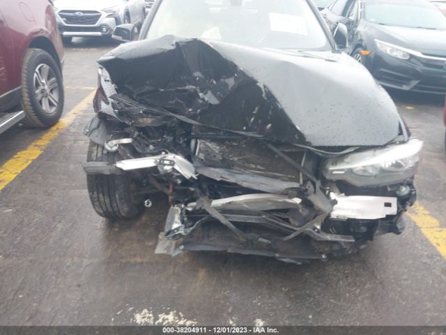 WBA3B1C5XEK132762 BMW 320i