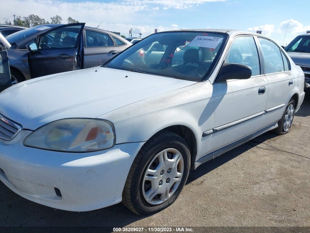 1999 HONDA CIVIC LX VIN: 2HGEJ6674XH552621