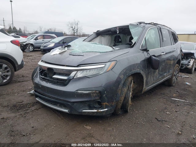 2021 HONDA PILOT AWD TOURING 7 PASSENGER VIN: 5FNYF6H65MB033595