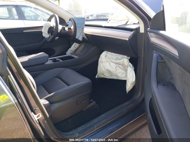 2023 TESLA MODEL Y 7SAYGDEE2PF899050 Photo 4