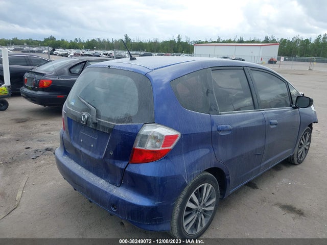 2010 HONDA FIT VIN: JHMGE8H25AS003548