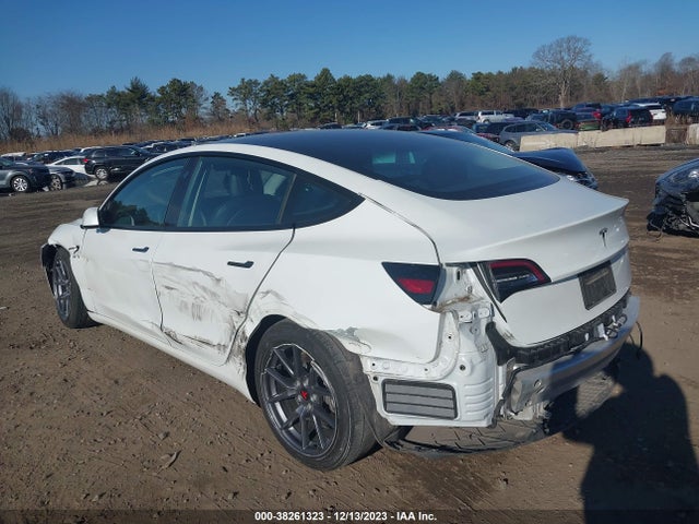 2021 TESLA MODEL 3 5YJ3E1EAXMF867712 Photo 2