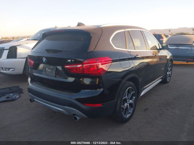 2018 BMW X1 WBXHU7C34J5H41364 Photo 3
