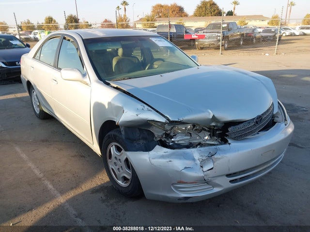 2003 TOYOTA CAMRY LE VIN: 4T1BF30K43U037409