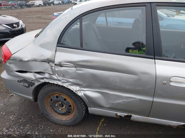 2004 KIA RIO VIN: KNADC125446285521