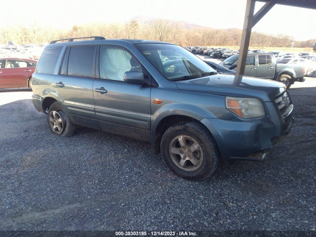 2007 HONDA PILOT EX-L VIN: 5FNYF18597B028057