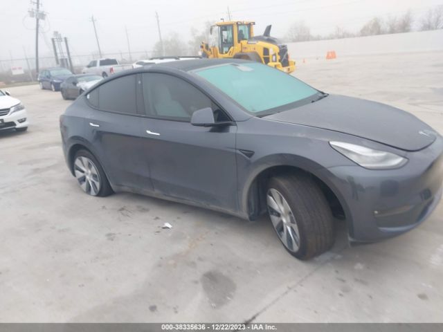 2022 Tesla Model Y Long Range Dual Motor All-wheel Drive მანქანა იყიდება აუქციონზე, vin: 7SAYGDEE9NF414089, აუქციონის ნომერი: 38335636