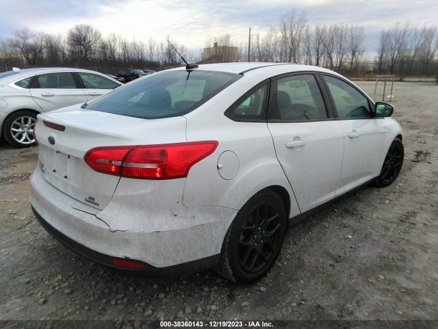 2016 FORD FOCUS SE VIN: 1FADP3F2XGL394063
