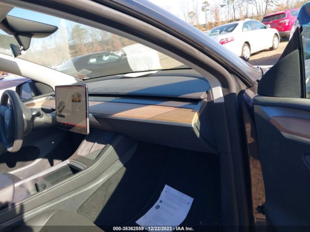 2023 TESLA MODEL Y 7SAYGDEE6PF874233 Photo 4