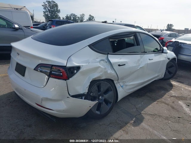 5YJ3E1EA1MF997121 Tesla Model 3 Standard Range Plus Rear-wheel Drive