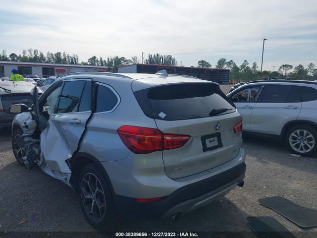 2019 BMW X1 WBXHU7C50K3H45068 Photo 2