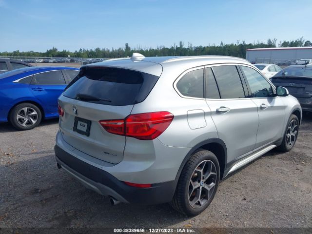 2019 BMW X1 WBXHU7C50K3H45068 Photo 3