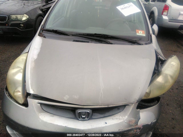 2007 HONDA FIT VIN: JHMGD38467S035134