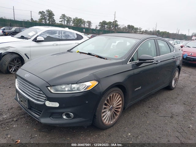 2014 FORD FUSION HYBRID TITANIUM VIN: 3FA6P0RU8ER324337
