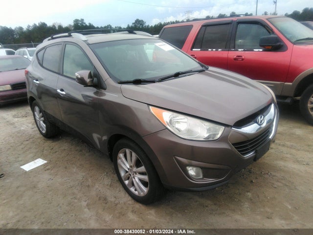 2012 HYUNDAI TUCSON LIMITED VIN: KM8JU3AC1CU318026