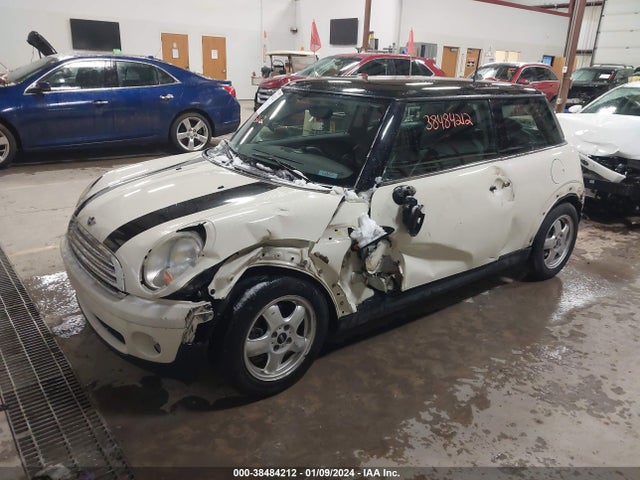 2009 MINI COOPER WMWMF335X9TU75737 Photo 1