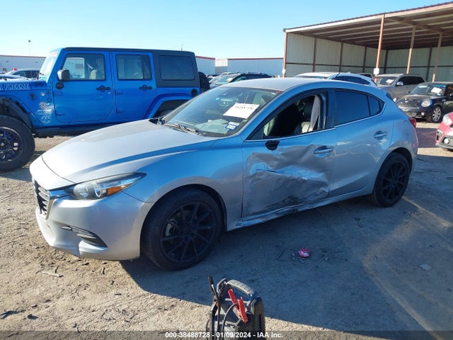 3MZBN1L34JM195487 Mazda Mazda3 Touring