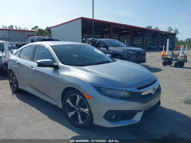 Honda Civic Touring 2017 19XFC1F93HE000574 Image 1