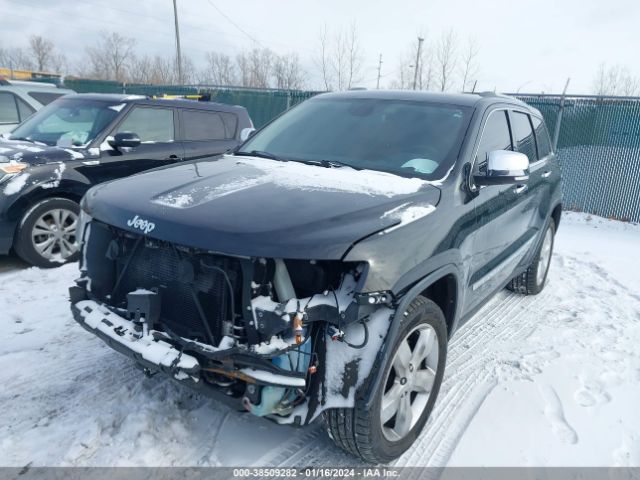 2011 JEEP GRAND CHEROKEE 1J4RR6GT2BC702459 Photo 1